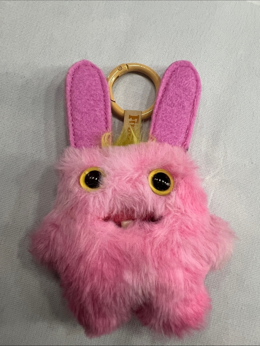 pink fuggler keychain